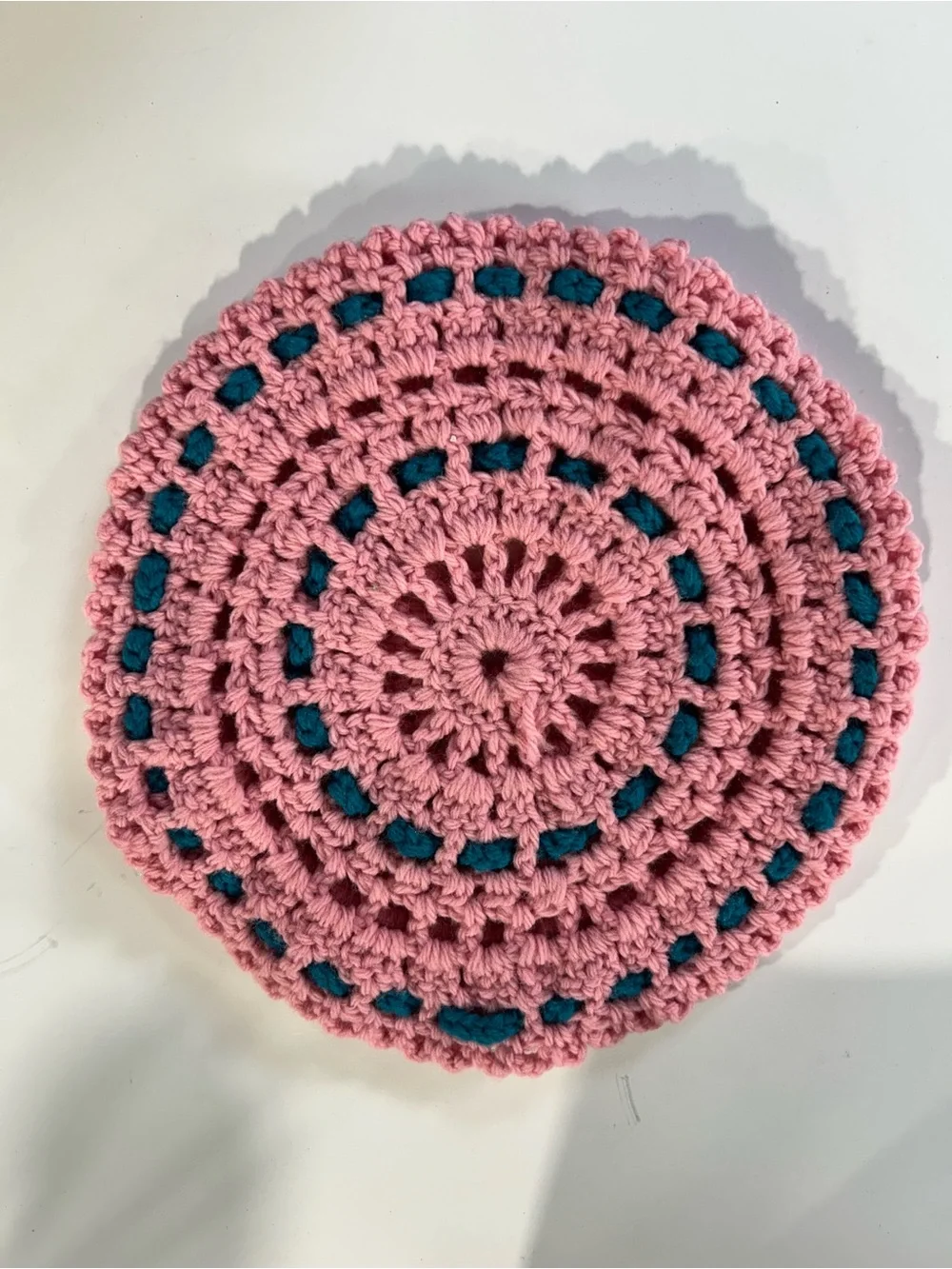Handmade Pink Crochet Hotpad with Teal Accents